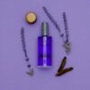 Lavender stems laid around a MIDNITE After Shave 3.3oz bottle