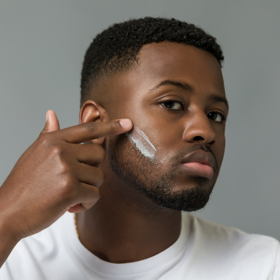 Man applying Shave Cream to prep face for shaving