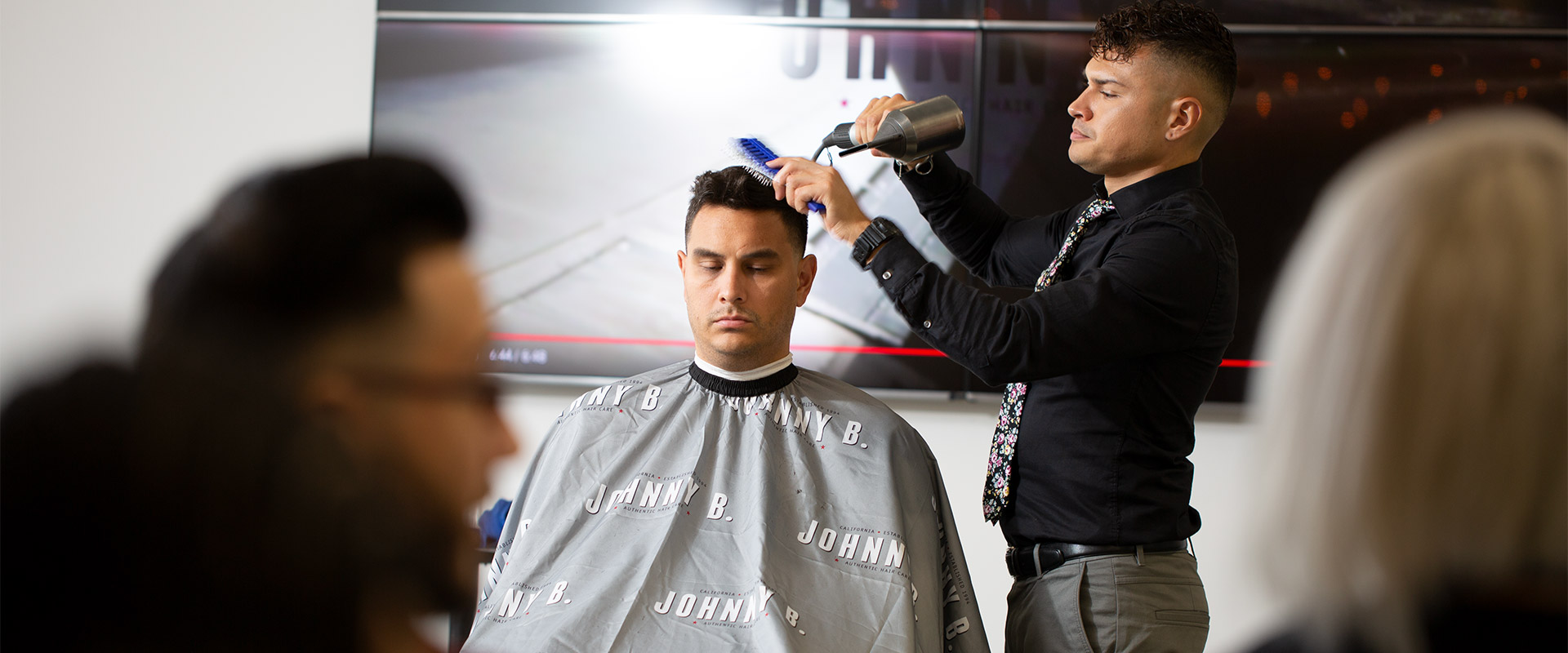 profirst-highlight Johnny B educator blowdrying customer hair