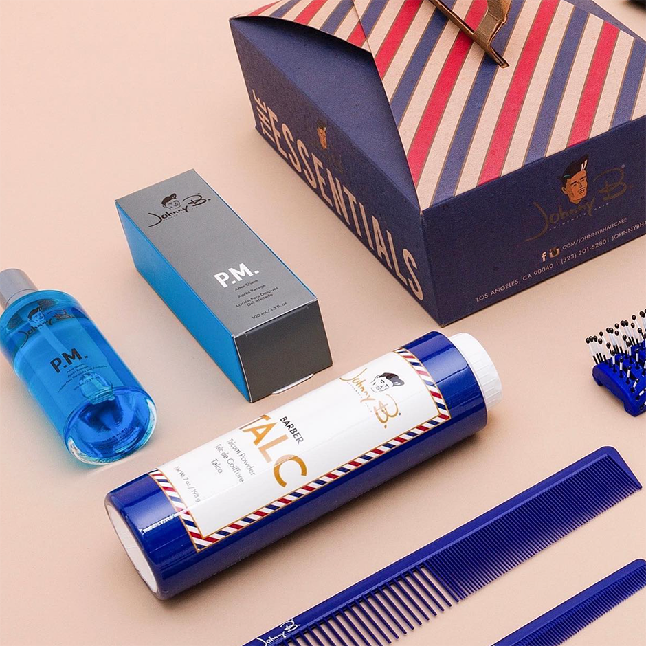 Essentials Box bundle. Items include combs, Talc, and Aftershave
